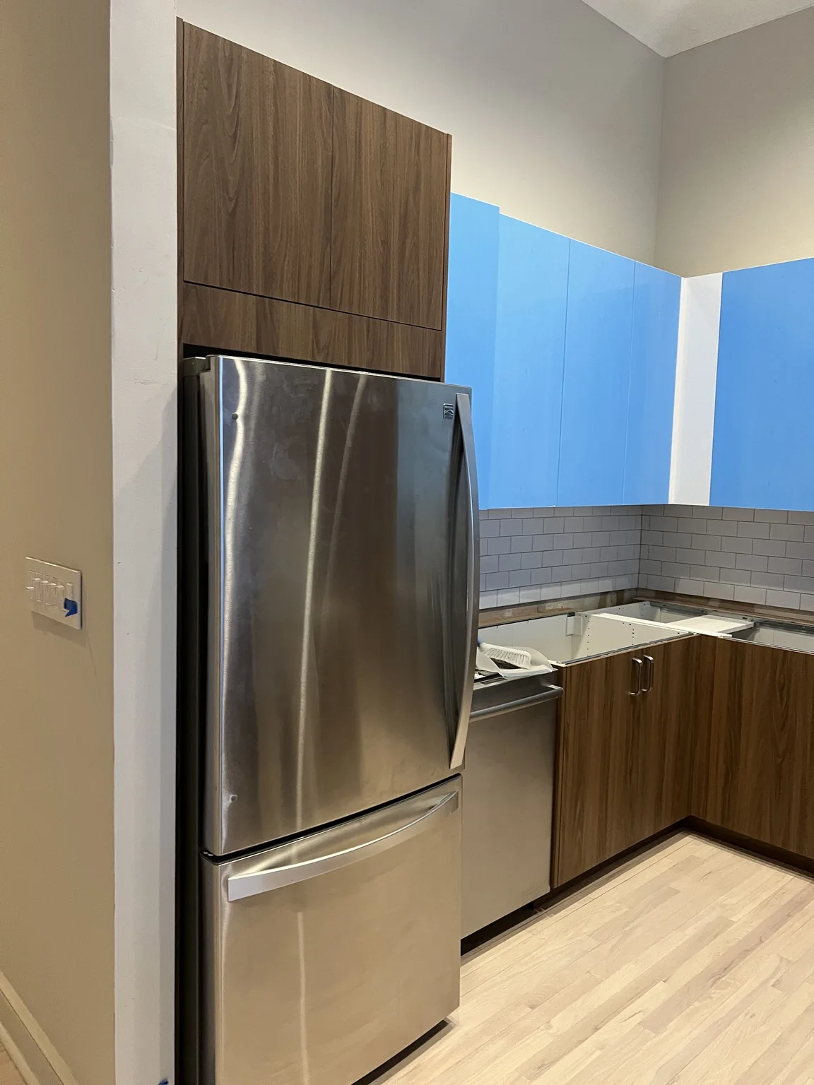 IKEA kitchen installation near Bronx, NY — Walnut Cabinets with Blue Countertop