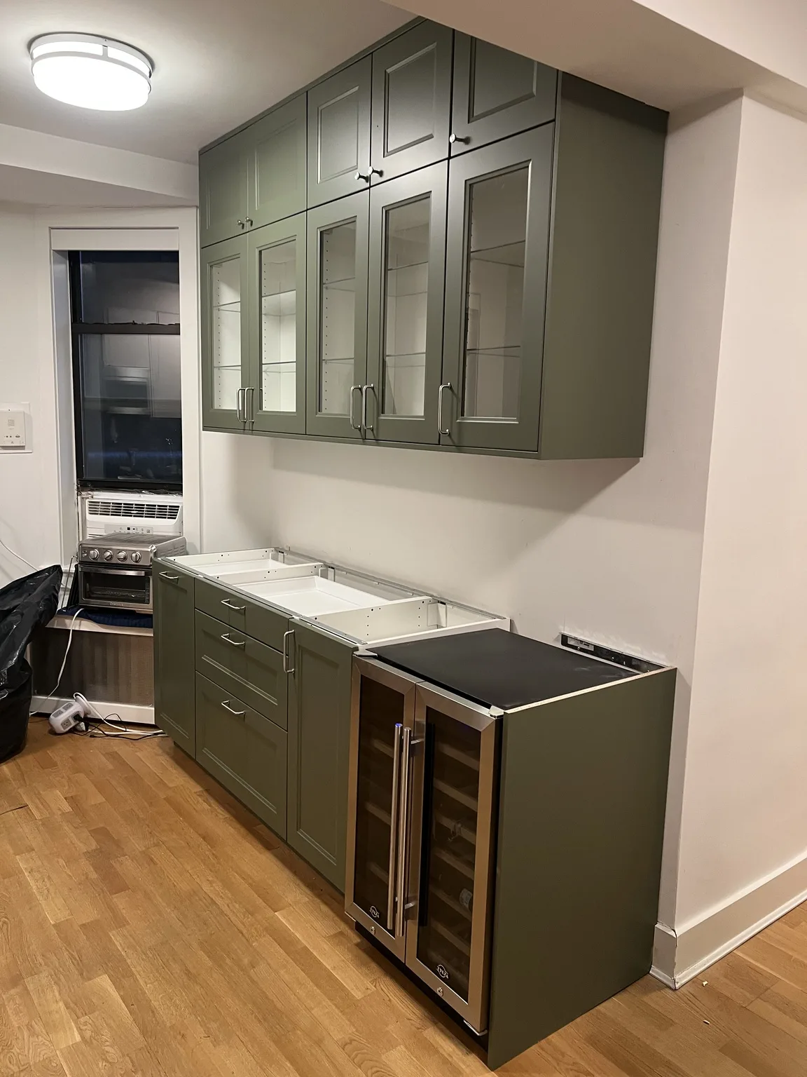 Sage Green Kitchen with Wine Storage